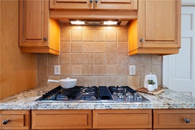 Grandover living is a lifestyle! This custom-built home on Grandover Resort in North Carolina - for sale on GolfHomes.com, golf home, golf lot
