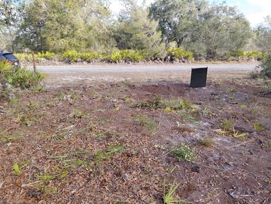 Build your dream home on this half-acre lot in the lake and golf on Indian Lake Estates Golf and Country Club in Florida - for sale on GolfHomes.com, golf home, golf lot