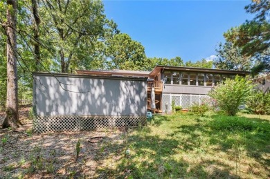 Fantastic family home that has been recently remodeled and is on Bella Vista - Metfield Golf Complex and Country Club in Arkansas - for sale on GolfHomes.com, golf home, golf lot