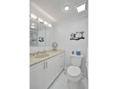 This beautifully renovated 2-bedroom unit is fully furnished and on Inverrary Country Club in Florida - for sale on GolfHomes.com, golf home, golf lot