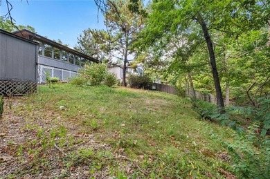 Fantastic family home that has been recently remodeled and is on Bella Vista - Metfield Golf Complex and Country Club in Arkansas - for sale on GolfHomes.com, golf home, golf lot