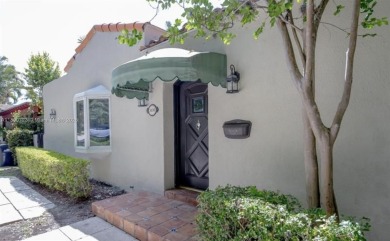 Step into timeless elegance in this classic Miami Beach home on Miami Beach Golf Club in Florida - for sale on GolfHomes.com, golf home, golf lot