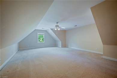Grandover living is a lifestyle! This custom-built home on Grandover Resort in North Carolina - for sale on GolfHomes.com, golf home, golf lot
