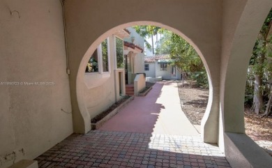 Step into timeless elegance in this classic Miami Beach home on Miami Beach Golf Club in Florida - for sale on GolfHomes.com, golf home, golf lot