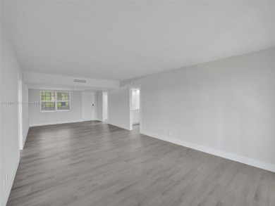 Discover luxurious living in this fully renovated 3-bedroom on Palm-Aire Country Club and Resort - The Oaks in Florida - for sale on GolfHomes.com, golf home, golf lot