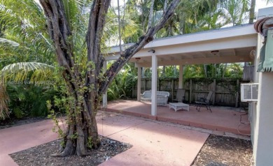 Step into timeless elegance in this classic Miami Beach home on Miami Beach Golf Club in Florida - for sale on GolfHomes.com, golf home, golf lot
