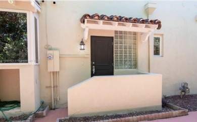 Step into timeless elegance in this classic Miami Beach home on Miami Beach Golf Club in Florida - for sale on GolfHomes.com, golf home, golf lot
