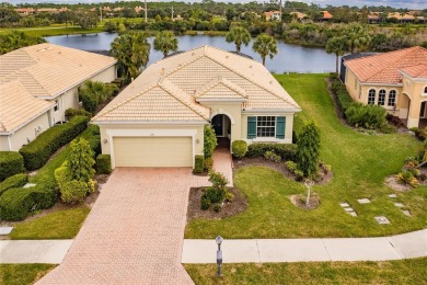 Welcome to 333 Cipriani Way, a charming and elegant residence on Venetian Golf and River Club in Florida - for sale on GolfHomes.com, golf home, golf lot