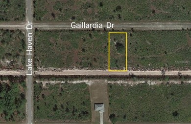 Build your dream home on this half-acre lot in the lake and golf on Indian Lake Estates Golf and Country Club in Florida - for sale on GolfHomes.com, golf home, golf lot