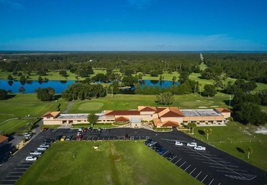 Build your dream home on this half-acre lot in the lake and golf on Indian Lake Estates Golf and Country Club in Florida - for sale on GolfHomes.com, golf home, golf lot