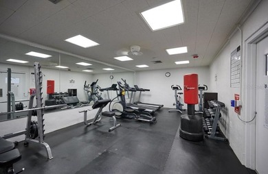 Build your dream home on this half-acre lot in the lake and golf on Indian Lake Estates Golf and Country Club in Florida - for sale on GolfHomes.com, golf home, golf lot