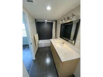 Step into this spacious condo, ideally situated on the 3rd floor on Boca Dunes Golf and Country Club in Florida - for sale on GolfHomes.com, golf home, golf lot