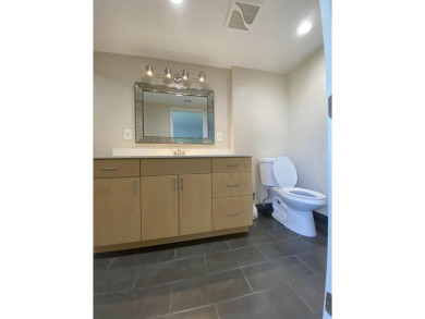 Step into this spacious condo, ideally situated on the 3rd floor on Boca Dunes Golf and Country Club in Florida - for sale on GolfHomes.com, golf home, golf lot