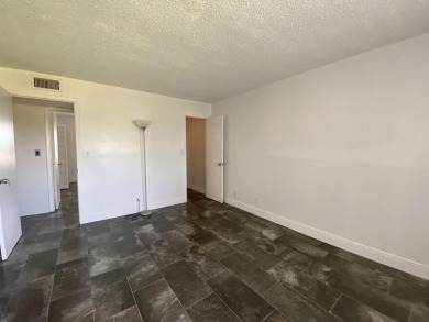 Step into this spacious condo, ideally situated on the 3rd floor on Boca Dunes Golf and Country Club in Florida - for sale on GolfHomes.com, golf home, golf lot
