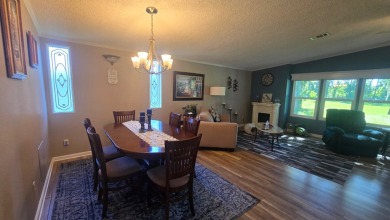Welcome to this beautifully maintained and fully remodeled home on Hamptons Golf Club in Florida - for sale on GolfHomes.com, golf home, golf lot