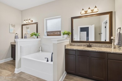 Welcome to your own oasis in the highly sought-after Windance on Windance Country Club in Mississippi - for sale on GolfHomes.com, golf home, golf lot