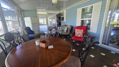 Welcome to this beautifully maintained and fully remodeled home on Hamptons Golf Club in Florida - for sale on GolfHomes.com, golf home, golf lot