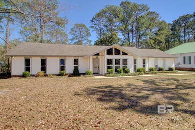 Live where the fairway meets home in this beautifully remodeled on Cypress Country Club and Golf Club  in Alabama - for sale on GolfHomes.com, golf home, golf lot