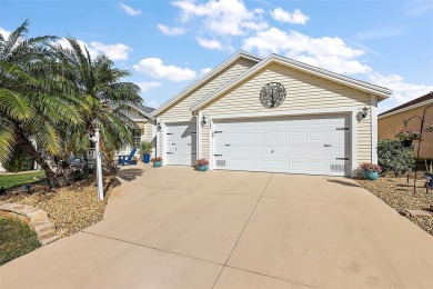 Located in the desirable Village of Sunset Pointe, this updated on The Links of Spruce Creek in Florida - for sale on GolfHomes.com, golf home, golf lot