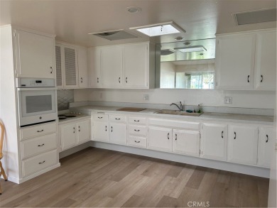 Are you ready for the perfect home for relaxing and enjoying the on Leisure World Seal Beach Golf Course in California - for sale on GolfHomes.com, golf home, golf lot