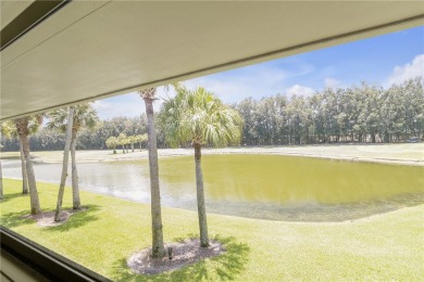 Come cozy up in this charming condo boasting picturesque lake on Vista Plantation Golf Club in Florida - for sale on GolfHomes.com, golf home, golf lot