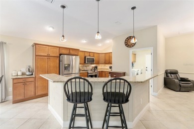 BOND PAID! DESIGNER IRIS MODEL IN THE VILLAGE OF DUNEDIN! on Pennbrooke Fairways in Florida - for sale on GolfHomes.com, golf home, golf lot