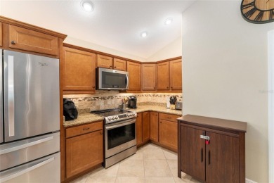 BOND PAID! DESIGNER IRIS MODEL IN THE VILLAGE OF DUNEDIN! on Pennbrooke Fairways in Florida - for sale on GolfHomes.com, golf home, golf lot