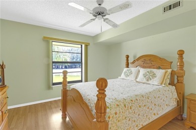 Come cozy up in this charming condo boasting picturesque lake on Vista Plantation Golf Club in Florida - for sale on GolfHomes.com, golf home, golf lot