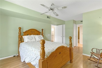 Come cozy up in this charming condo boasting picturesque lake on Vista Plantation Golf Club in Florida - for sale on GolfHomes.com, golf home, golf lot