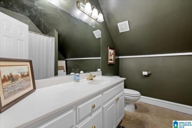 Welcome to this stunning 4-bedroom, 3-bath home located in on Heritage Green  Golf Course in Alabama - for sale on GolfHomes.com, golf home, golf lot