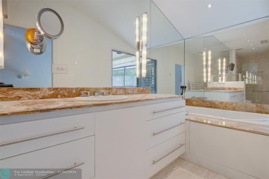 WELCOME TO THIS TWO-STORY CHARMING TOWNHOUSE IN A FAMILY on Turnberry Isle Resort and Club in Florida - for sale on GolfHomes.com, golf home, golf lot