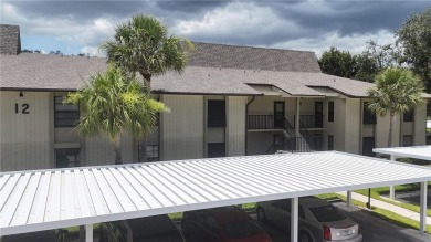 Come cozy up in this charming condo boasting picturesque lake on Vista Plantation Golf Club in Florida - for sale on GolfHomes.com, golf home, golf lot