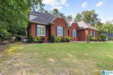 Welcome to this stunning 4-bedroom, 3-bath home located in on Heritage Green  Golf Course in Alabama - for sale on GolfHomes.com, golf home, golf lot