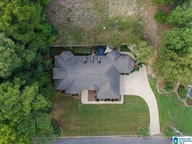 Welcome to this stunning 4-bedroom, 3-bath home located in on Heritage Green  Golf Course in Alabama - for sale on GolfHomes.com, golf home, golf lot