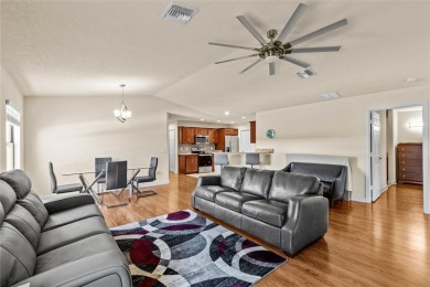 Clean. Crisp. Carefree. This 2020 CBS home has been so lightly on Spanish Lakes Country Club in Florida - for sale on GolfHomes.com, golf home, golf lot