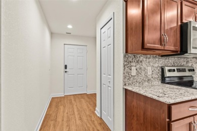 Clean. Crisp. Carefree. This 2020 CBS home has been so lightly on Spanish Lakes Country Club in Florida - for sale on GolfHomes.com, golf home, golf lot