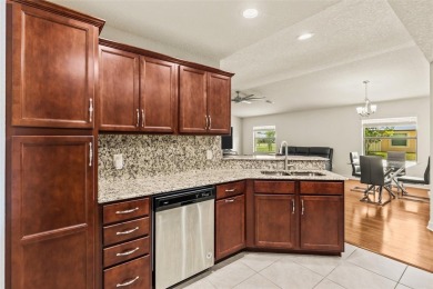 Clean. Crisp. Carefree. This 2020 CBS home has been so lightly on Spanish Lakes Country Club in Florida - for sale on GolfHomes.com, golf home, golf lot
