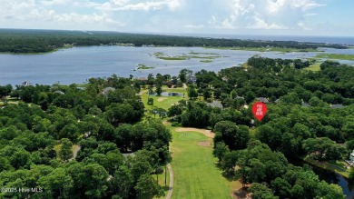 Build your dream home on this spacious lot overlooking the lush on Lockwood Folly Country Club in North Carolina - for sale on GolfHomes.com, golf home, golf lot