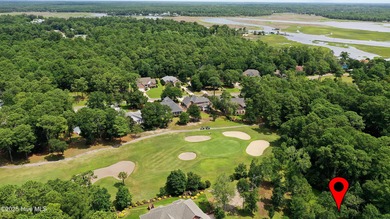 Build your dream home on this spacious lot overlooking the lush on Lockwood Folly Country Club in North Carolina - for sale on GolfHomes.com, golf home, golf lot