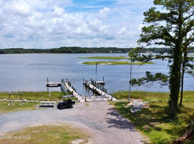 Build your dream home on this spacious lot overlooking the lush on Lockwood Folly Country Club in North Carolina - for sale on GolfHomes.com, golf home, golf lot