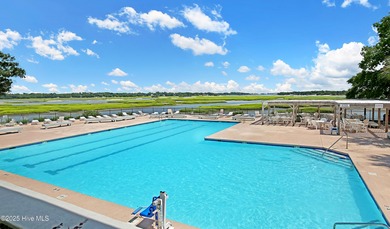 Build your dream home on this spacious lot overlooking the lush on Lockwood Folly Country Club in North Carolina - for sale on GolfHomes.com, golf home, golf lot