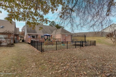 Wrap THIS DOLLHOUSE up and hang it in your stocking for on Hernando Hills Country Club in Mississippi - for sale on GolfHomes.com, golf home, golf lot