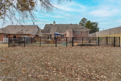 Wrap THIS DOLLHOUSE up and hang it in your stocking for on Hernando Hills Country Club in Mississippi - for sale on GolfHomes.com, golf home, golf lot