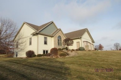 CROSSING MEADOWS ESTATE: Beautiful custom built 3 bedroom, 3 on Viroqua Hills Golf Club in Wisconsin - for sale on GolfHomes.com, golf home, golf lot