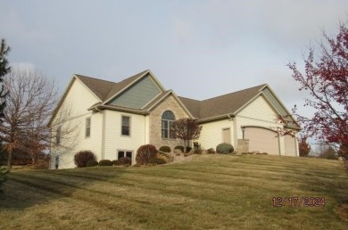 CROSSING MEADOWS ESTATE: Beautiful custom built 3 bedroom, 3 on Viroqua Hills Golf Club in Wisconsin - for sale on GolfHomes.com, golf home, golf lot