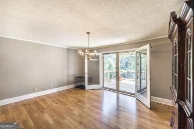 This beautifully updated home is located in a private gated on Canongate At Healy Point Country Club in Georgia - for sale on GolfHomes.com, golf home, golf lot