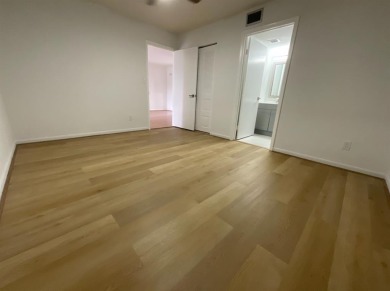 Beautiful 2BD/2BA condo in the peaceful Palm Springs 3 community on Oriole Golf and Tennis Club in Florida - for sale on GolfHomes.com, golf home, golf lot