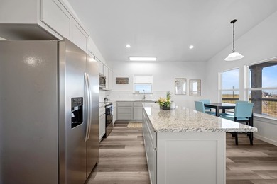 Island-Style Coastal Retreat in Holiday Beach, Rockport, TX on Lamar Golf Course in Texas - for sale on GolfHomes.com, golf home, golf lot