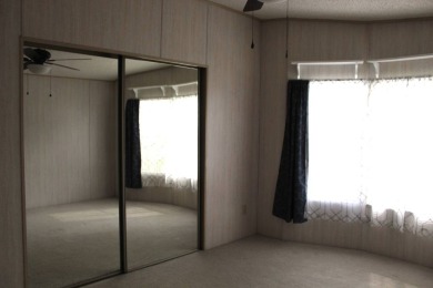 Welcome to this beautifully updated 2-bedroom home that offers on Schalamar Creek Golf and Country Club in Florida - for sale on GolfHomes.com, golf home, golf lot
