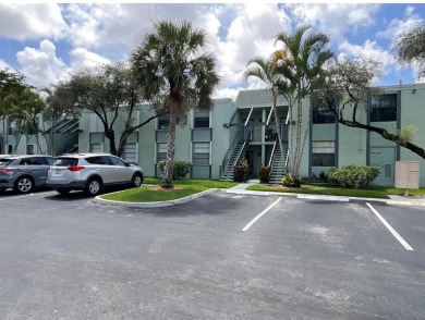 Beautiful 2BD/2BA condo in the peaceful Palm Springs 3 community on Oriole Golf and Tennis Club in Florida - for sale on GolfHomes.com, golf home, golf lot